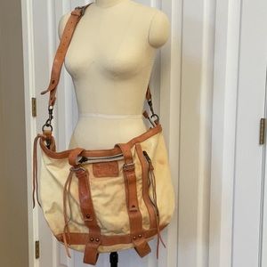 Allsaints Canvas and leather bag,made to look vintage w/  a lot of detail.